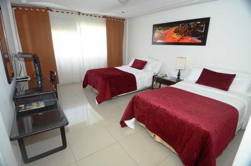 Hotel San Juan Internacional Giron Ruang foto