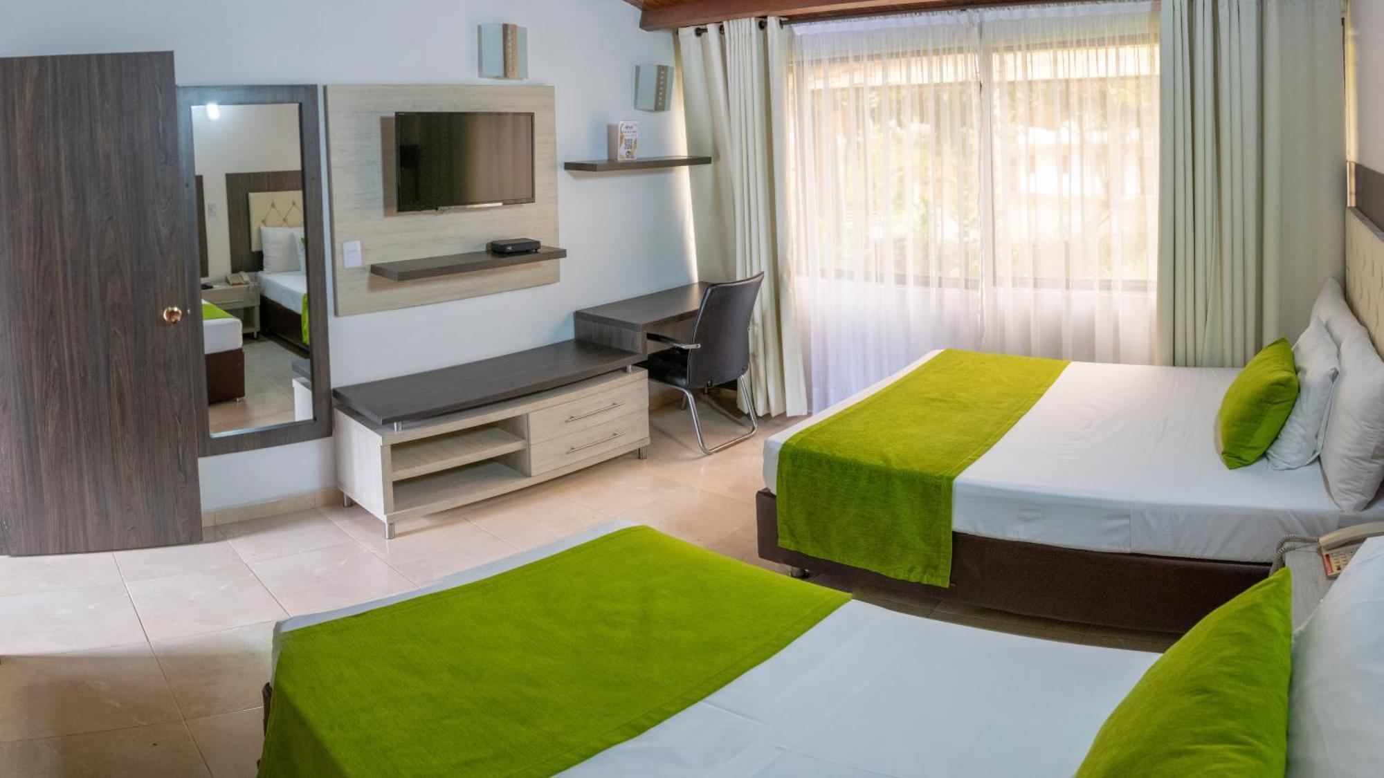 Hotel San Juan Internacional Giron Bagian luar foto