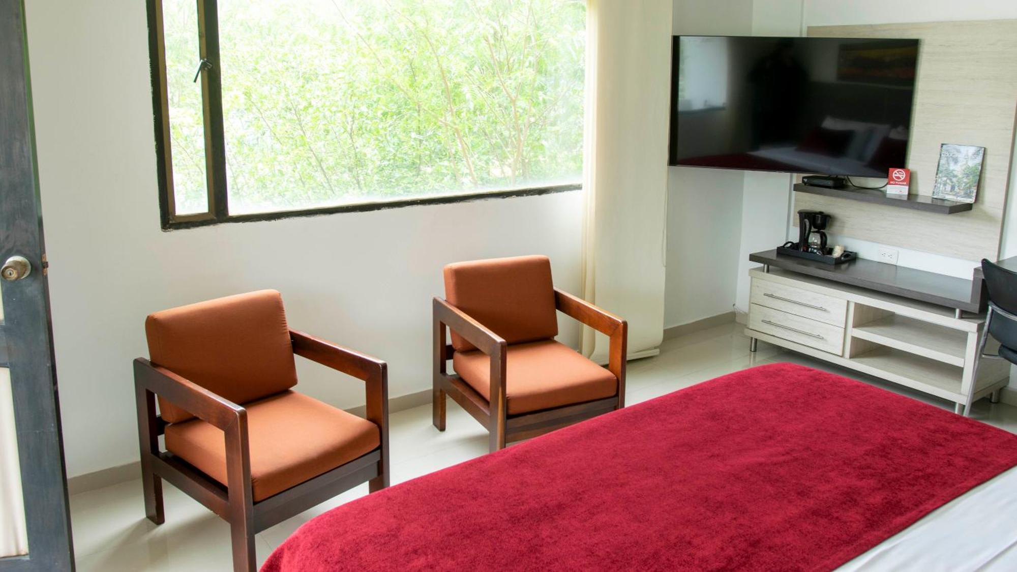 Hotel San Juan Internacional Giron Bagian luar foto