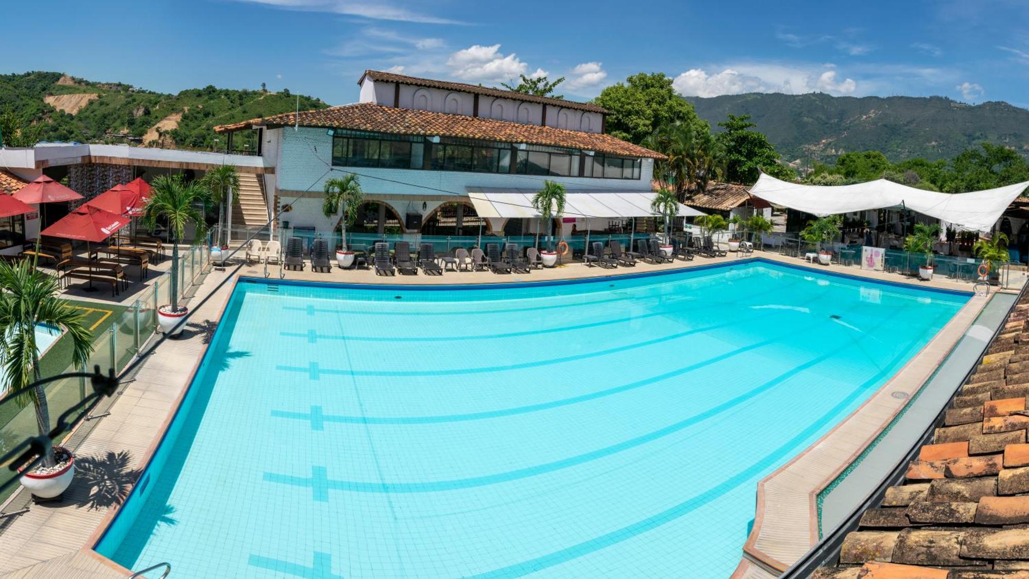 Hotel San Juan Internacional Giron Bagian luar foto
